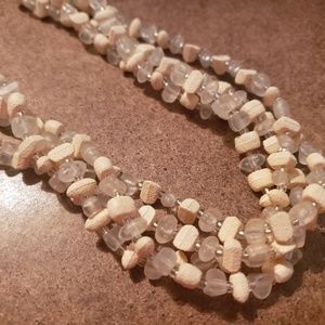 Shell and clear plastic necklace